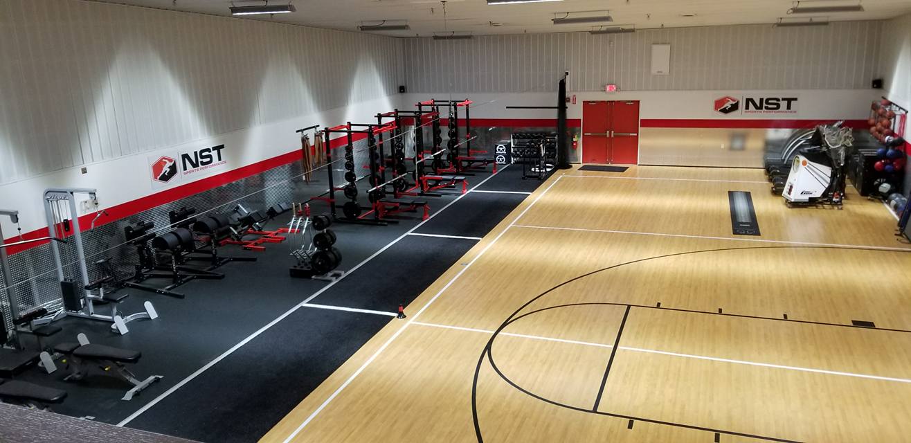Nst Fit Gym workout area with basket ball court